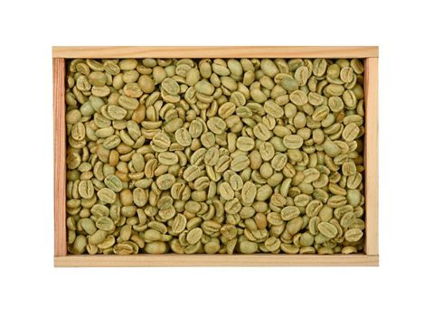 Wooden box of unroasted raw green coffee beans
