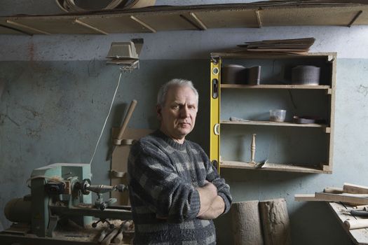Portrait of Carpenter in Workshop