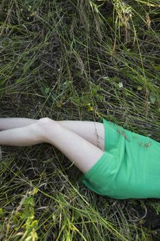 Woman Lying in Tall Grass