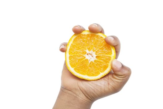 Cropped shot of a hand holding sliced pulpy orange against white background