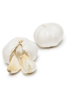 Garlic over white background