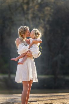 Mother And Daughter Enjoying A Day Outdoors