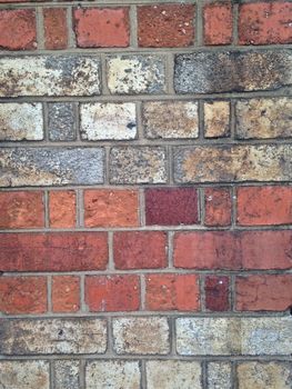 Dirty red brick wall