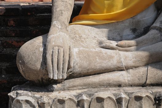 Hand of peaceful Buddha statue in Ancient City Thailand
