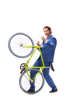 Young businessman using bike to commute to the office