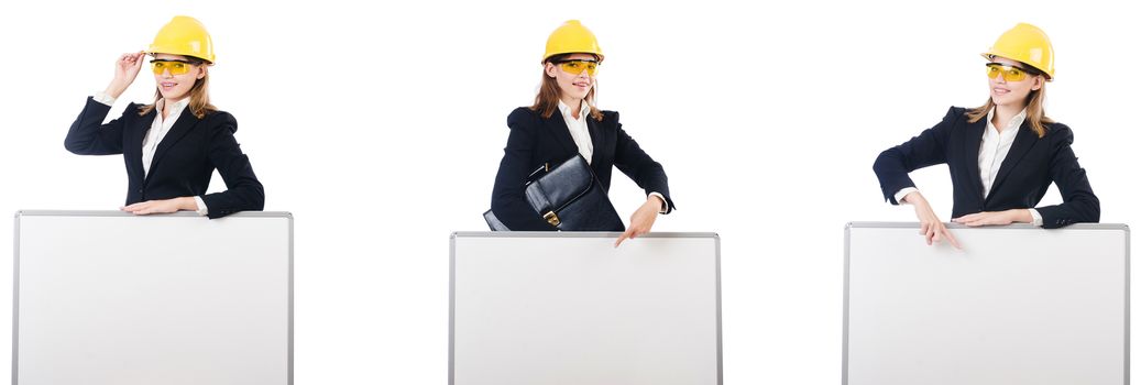 Young female builder with whiteboard 