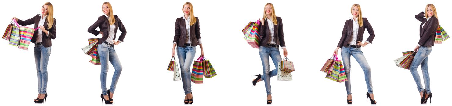 Beautiful woman with shopping bags isolated on white