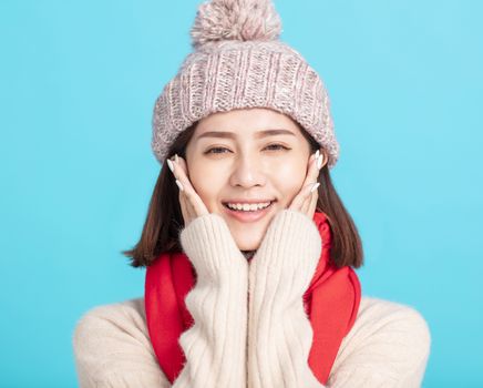 happy young asian woman wearing stylish warm clothes