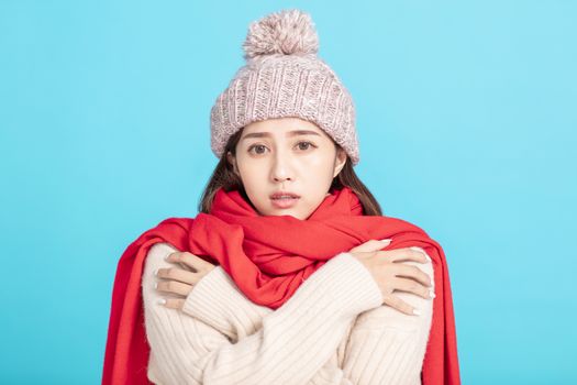 freezing young woman in winter cloth 