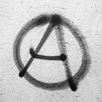 Anarchy symbol painted on wall