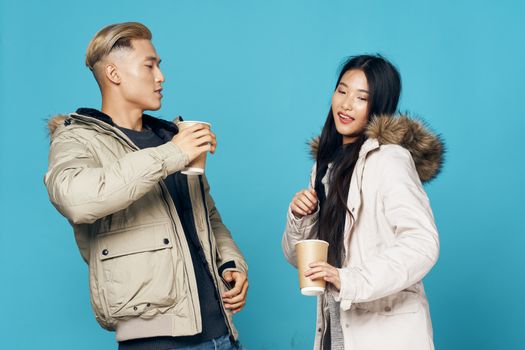 Young couple socializing lifestyle winter studio elegant style