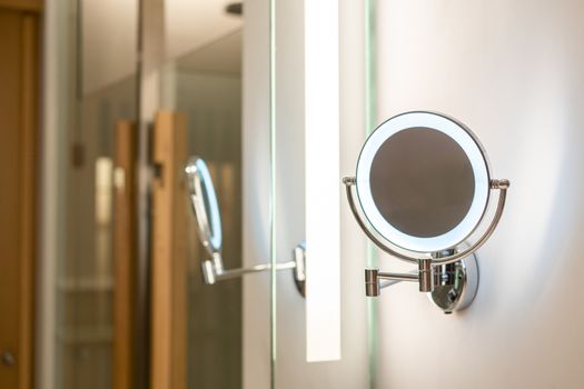 Ring light mirror with illumination in toilet. 