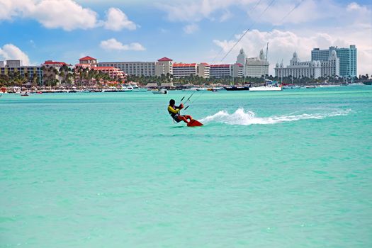 Kite surfing at Palm Beach on Aruba island in the Caribbean Sea