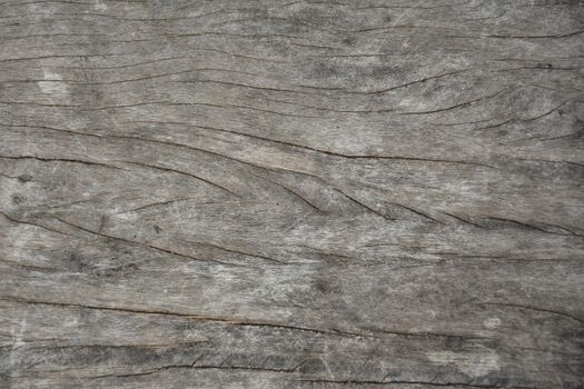 Gray wood with grain lines and nails 