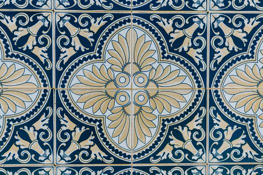 Background made of a portuguese tile with a mosaic in it
