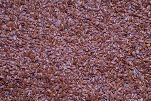 Close up of flax seeds as background, top view