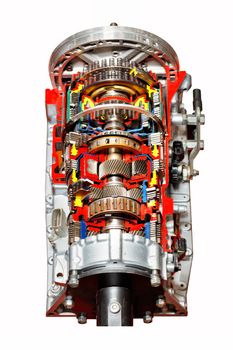 A cutaway automatic transmission of a modern car is presented at the exhibition stand, the image is isolated on a white background.