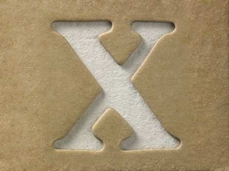cut out alphabet x on the brown cardboard