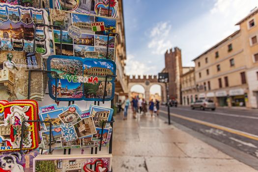 Iconic view of Verona with postcards