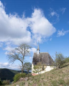 old chapel high above pommern and mosel valley in german eifel