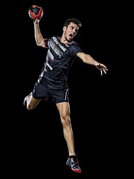 caucasian young handball player man isolated black background