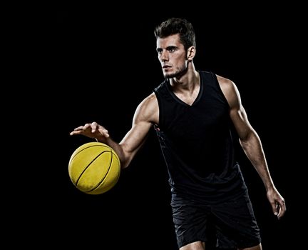 caucasian young basketball player manisolated black background