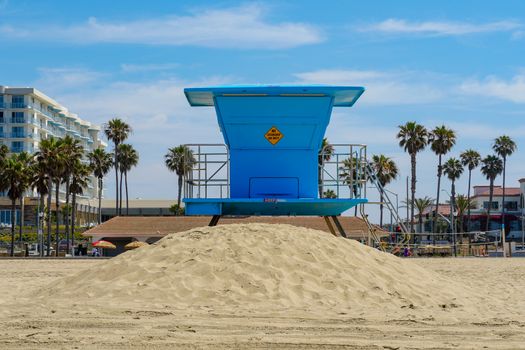 Lifeguard tower on the Huntington Beach during sunny day.