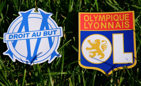 September 6, 2019, Marseille, France. Emblems of french football clubs Olympique Lyonnais and Olympique de Marseille.