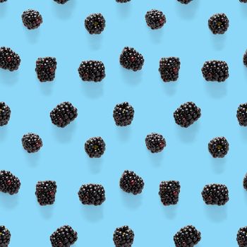 Bramble Seamless pattern. Fresh blackberry seamless pattern. Pattern with fresh wild berries isolated on blue background.