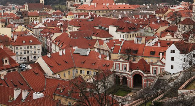 Prague roof tops. Aerial view of old red buildings in prague from top of city hall