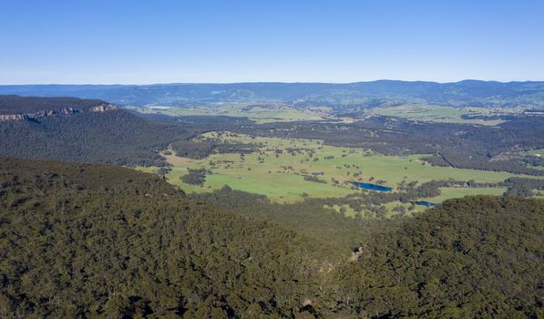 Aerial view of a green valley in The Blue Mountains
