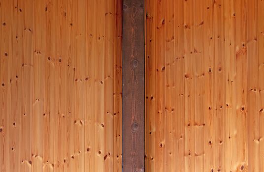 Rustic house ceiling with wide wooden beam support