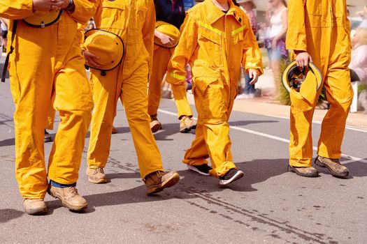 Firefighters Marching In A Street Parade