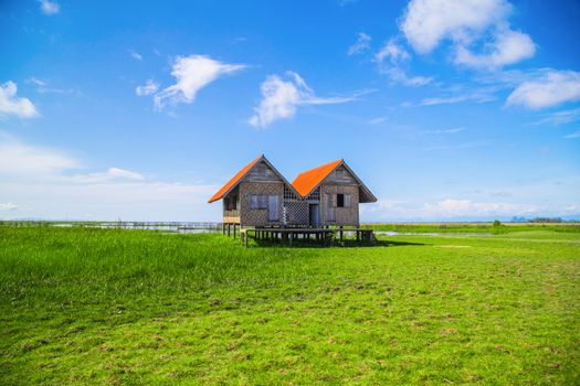 Twin old house on wetland at Talay Noi lake at Phatthalung, Thai