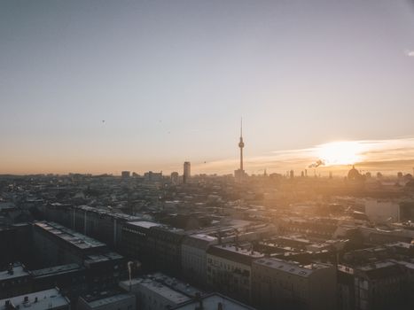 Beautiful Sunrise Morning above Berlin, Germany with Skyline Building Silhouette of Alexanderplatz and Smoke