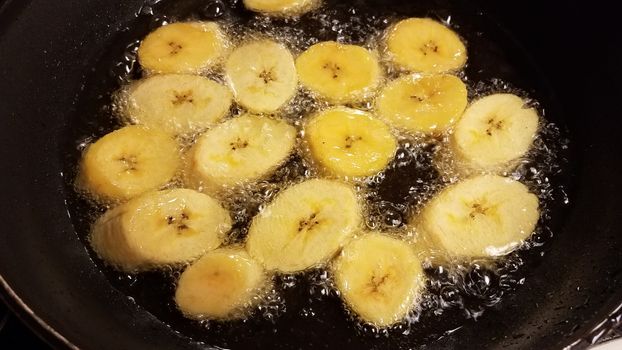 plantain banana from Puerto Rico boiling in oil