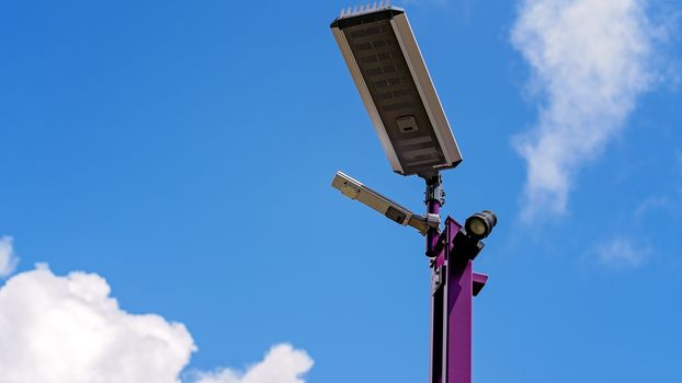 Solar Lights And Camera Monitoring On A Pole