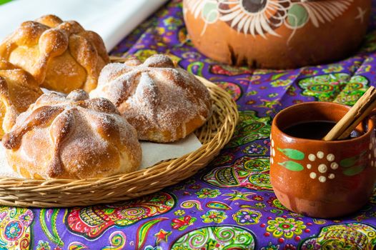Traditional Mexican bread of the dead, pan de muerto, with coffee