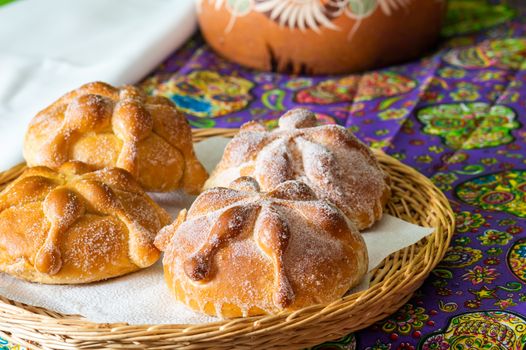 Traditional Mexican bread of the dead, pan de muerto, with coffee