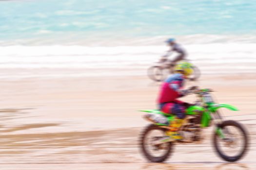 Panning Beach Motorbike Racing To Show Speed Motion