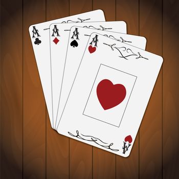 Ace of spades, ace of hearts, ace of diamonds, ace of clubs poker cards varnished wood background