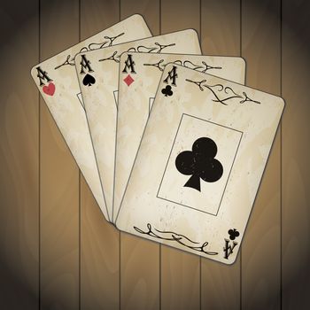 Ace of spades, ace of hearts, ace of diamonds, ace of clubs poker cards old look varnished wood background
