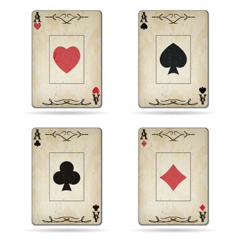 Ace of spades, ace of hearts, ace of diamonds, ace of clubs poker cards old look isolated on white background