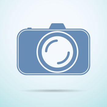 Professional photocamera flat icon on blue background
