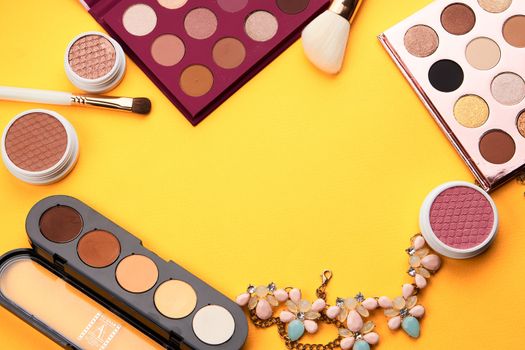 eyeshadow professional cosmetics blush powder yellow background top view