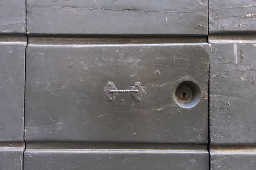 metal vintage handle on a old wooden door