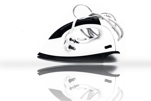 White colored iron or steam iron isolated on white.
