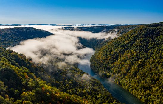 Narrow gorge of the Cheat River upstream of Coopers Rock State Park in West Virginia with fall colors