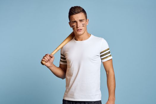 baseball guy with a bat in his hand on a blue background and a combat color on his face makeup model t-shirt