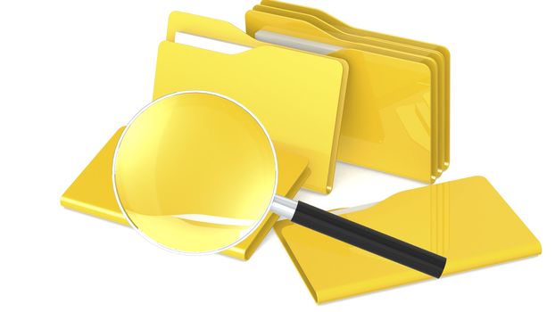 Yellow folder and magnifying glass
